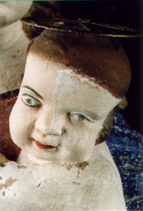 Kopf des Jesuskindes während der Freilegung